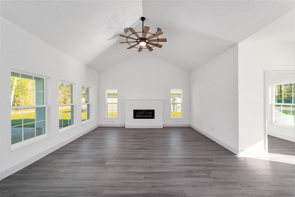 Empty room, Fireplace, Interior, Pendant Lights, Wood Texture Flooring
