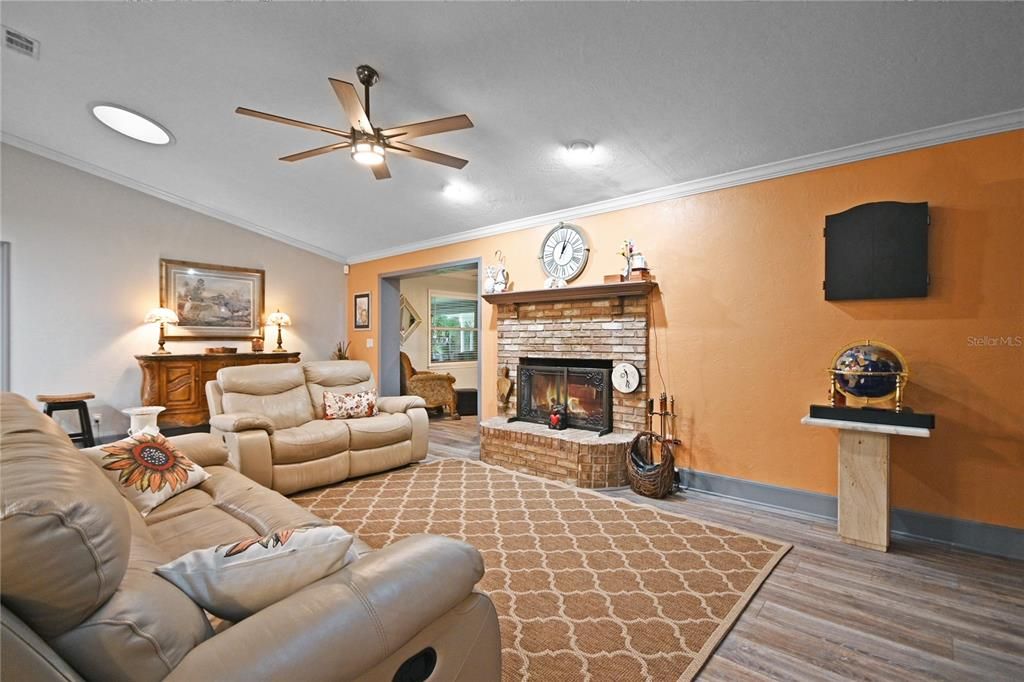 Fireplace, Interior, Living room, Recessed Lighting, Wood Texture Flooring