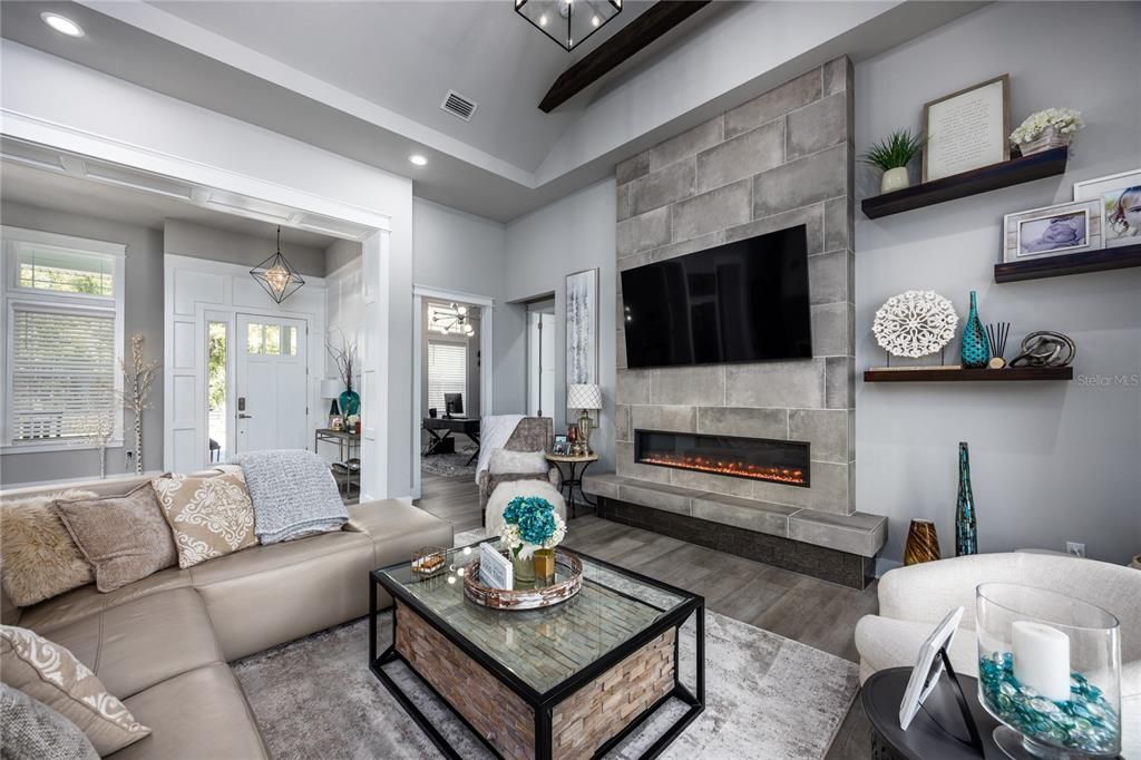 Fireplace, Interior, Living room, Pendant Lights, Recessed Lighting, Stone Walls, Wooden Beams, Wood Texture Flooring