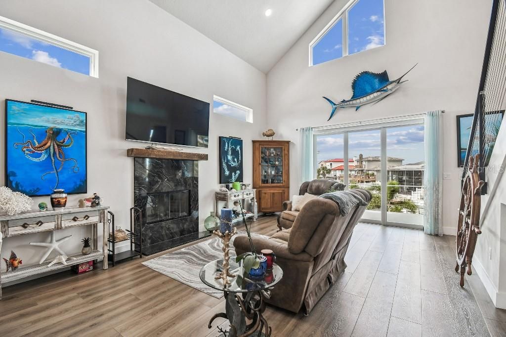 Fireplace, Interior, Living room, Recessed Lighting, Wood Texture Flooring