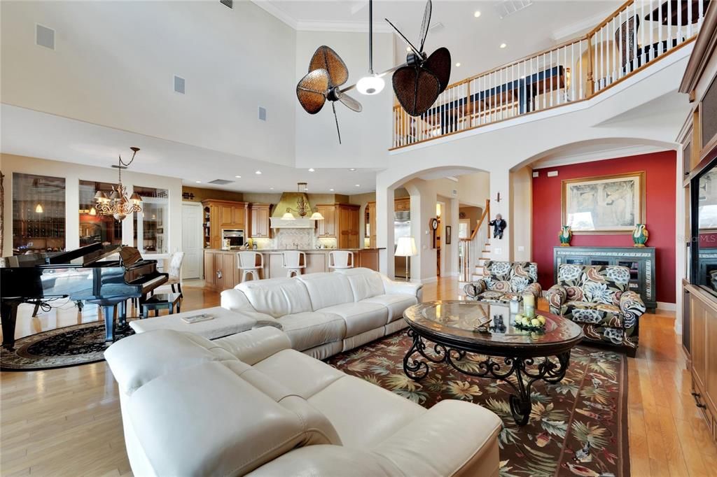 Chandelier, Dining room, Interior, Kitchen, Living room, Piano, Recessed Lighting, Wood Texture Flooring