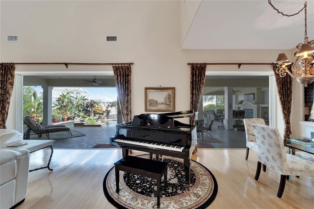 Dining room, Interior, Living room, Pendant Lights, Piano, Wood Texture Flooring
