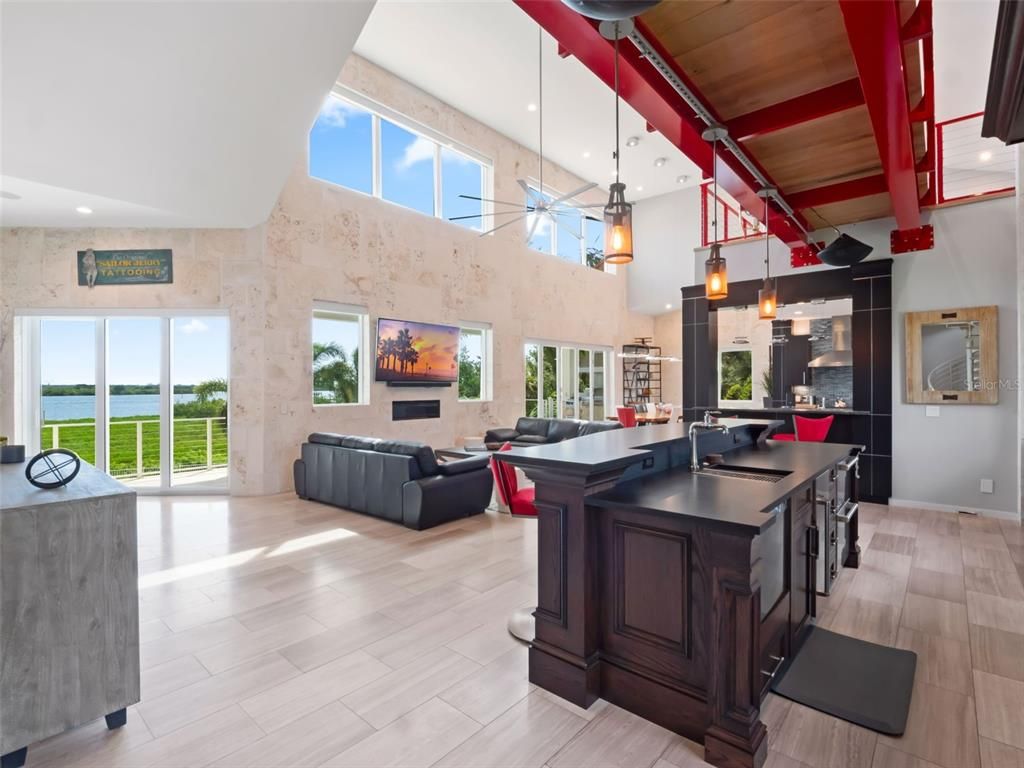 Dining room, Interior, Kitchen, Living room, Pendant Lights, Recessed Lighting, Water, Wooden Beams, Wooden Ceilings, Wood Texture Flooring