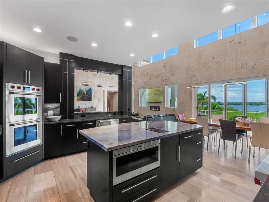 Dining room, Interior, Kitchen, Recessed Lighting, Stainless Steel Appliances, Water, Wood Texture Flooring