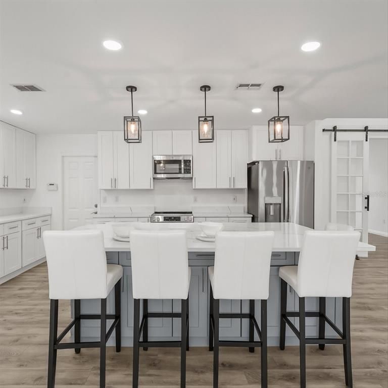 Interior, Kitchen, Pendant Lights, Recessed Lighting, Stainless Steel Appliances, Wood Texture Flooring