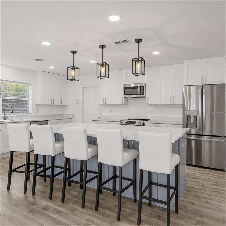 Interior, Kitchen, Pendant Lights, Recessed Lighting, Stainless Steel Appliances, Wood Texture Flooring