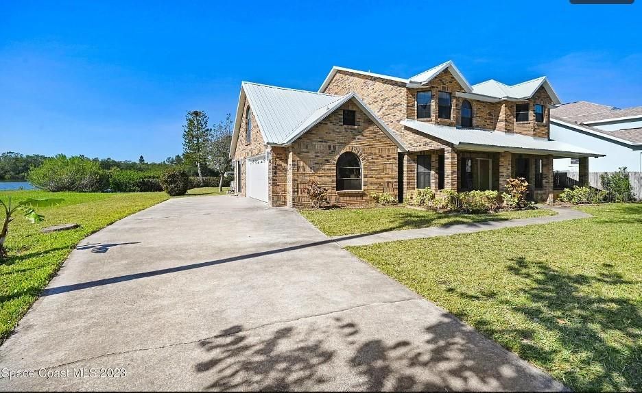 Attached, Backyard, Exterior, Facade, Brick Facade, Brick Traditional