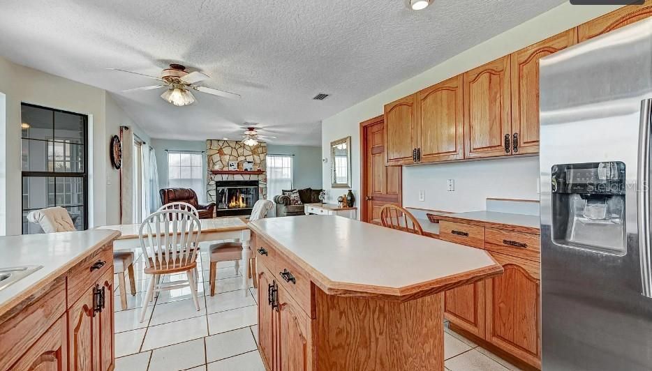 Dining room, Fireplace, Interior, Kitchen, Recessed Lighting