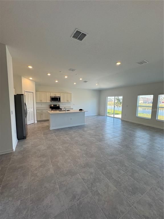 Empty room, Interior, Kitchen, Recessed Lighting, Stainless Steel Appliances