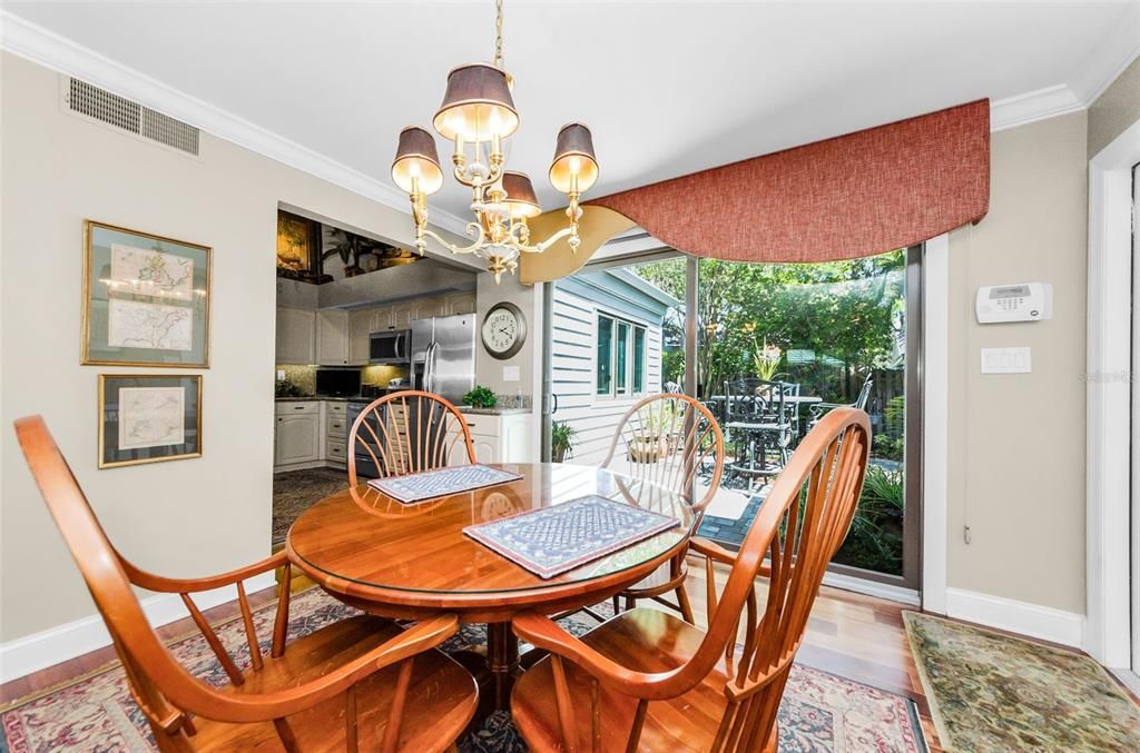 Chandelier, Dining room, Interior, Kitchen, Stainless Steel Appliances, Wood Texture Flooring