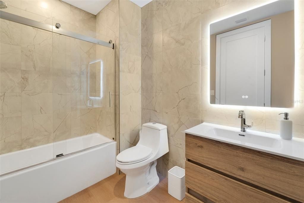 Bathroom, Glass Shower, Interior, Marble Walls, Wood Texture Flooring