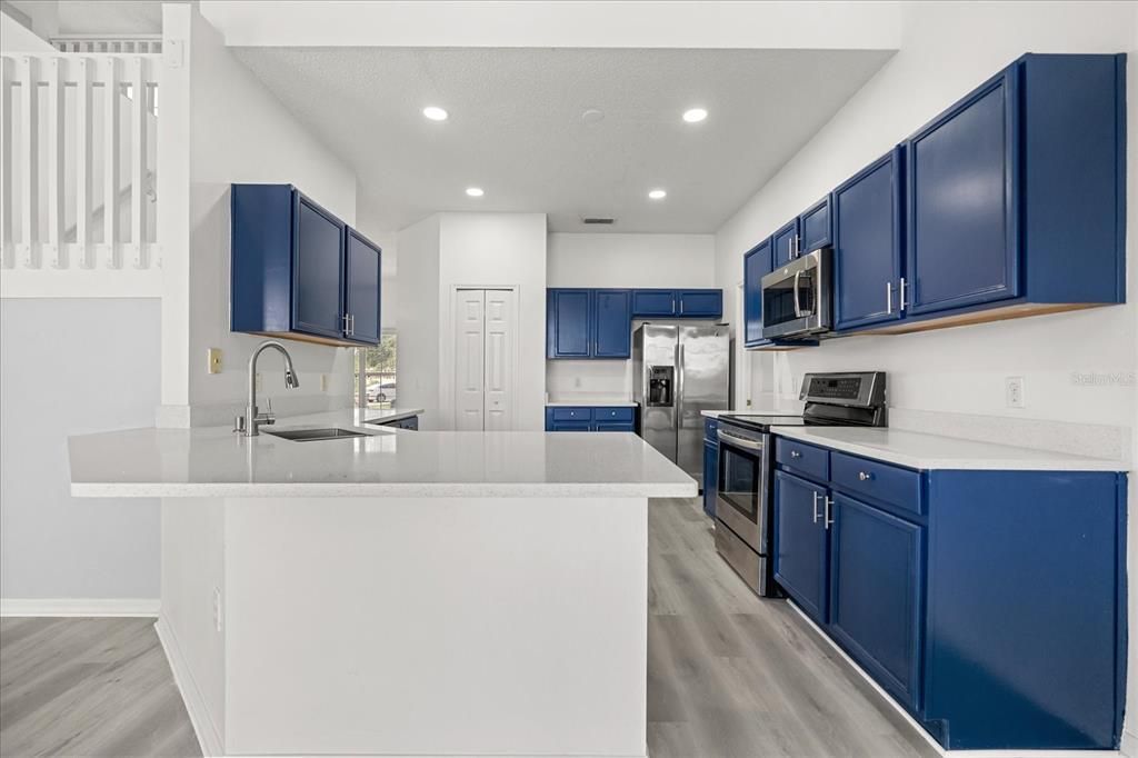 Interior, Kitchen, Recessed Lighting, Stainless Steel Appliances, Wood Texture Flooring