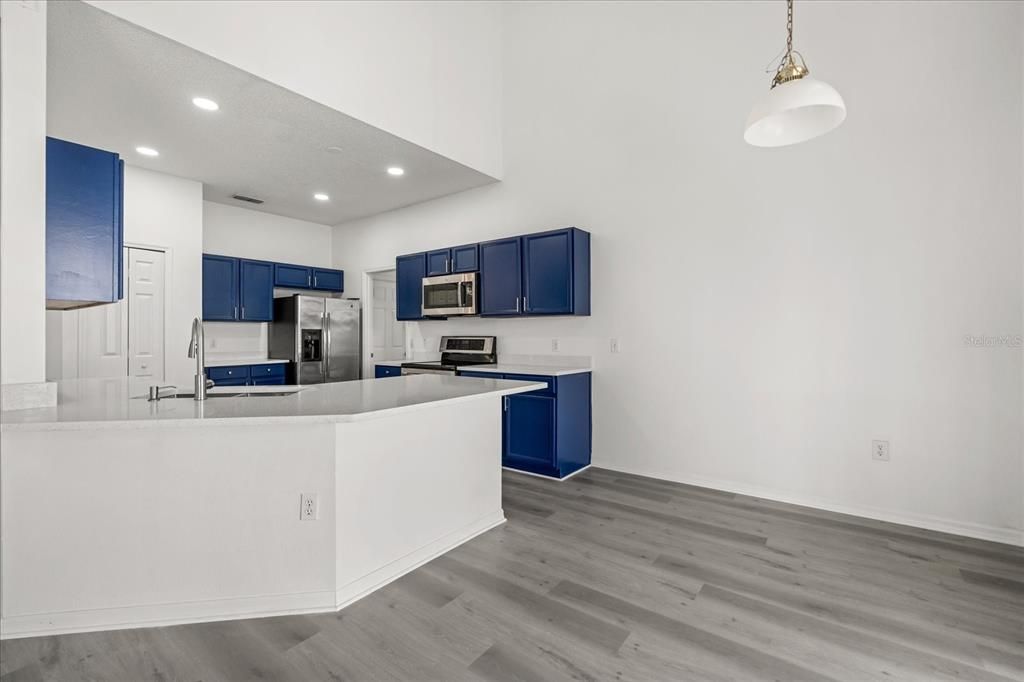 Interior, Kitchen, Pendant Lights, Recessed Lighting, Stainless Steel Appliances, Wood Texture Flooring
