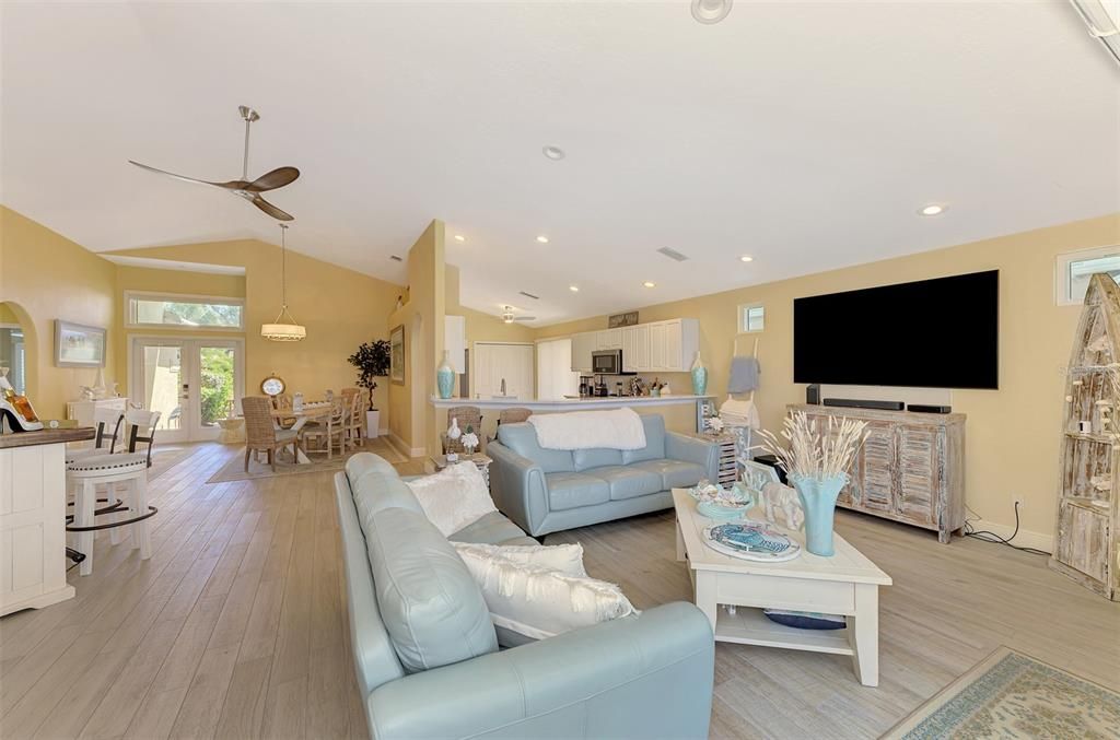 Dining room, Interior, Kitchen, Living room, Pendant Lights, Recessed Lighting, Stainless Steel Appliances, Wood Texture Flooring