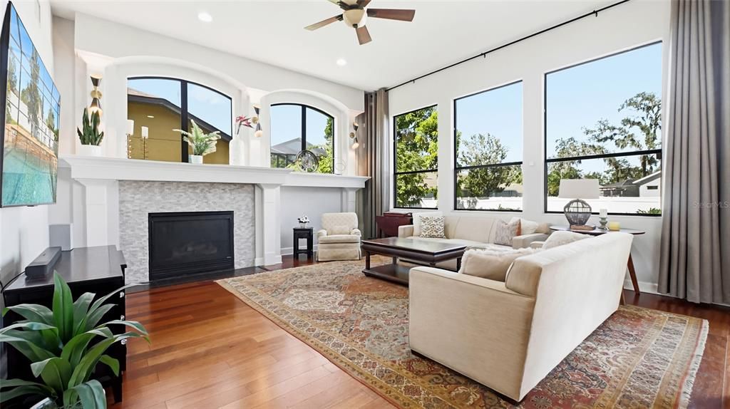 Fireplace, Interior, Living room, Recessed Lighting, Wood Texture Flooring