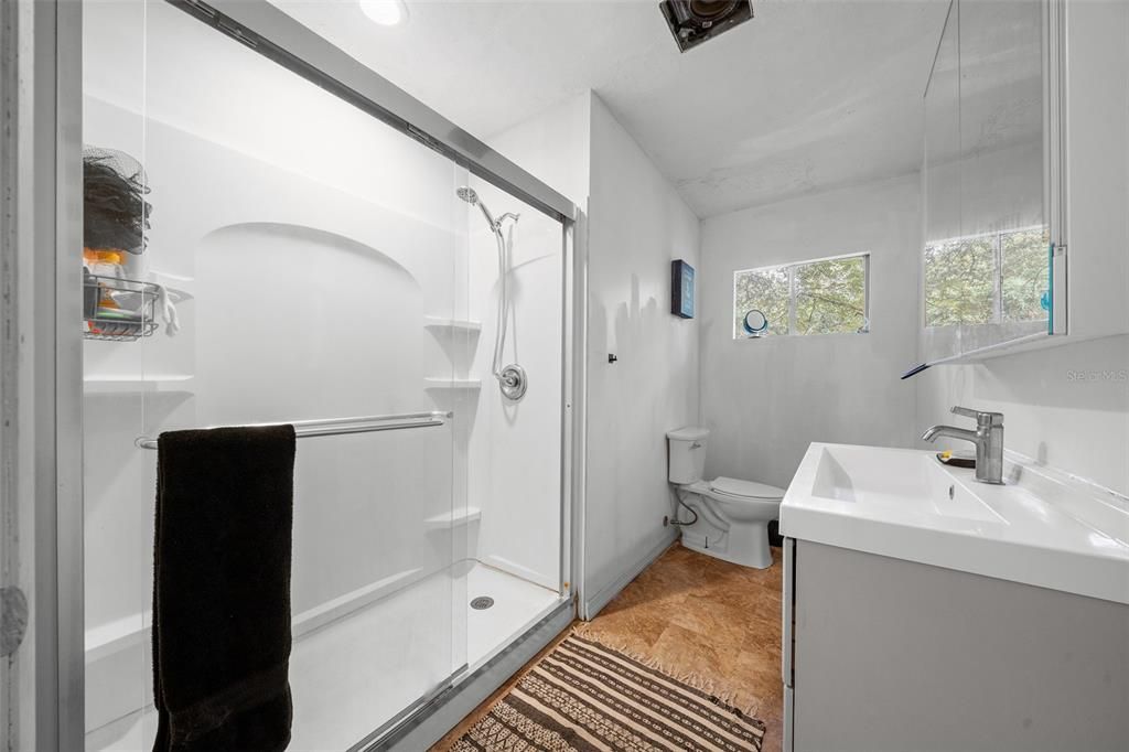 Bathroom, Glass Shower, Interior, Recessed Lighting, Wood Texture Flooring