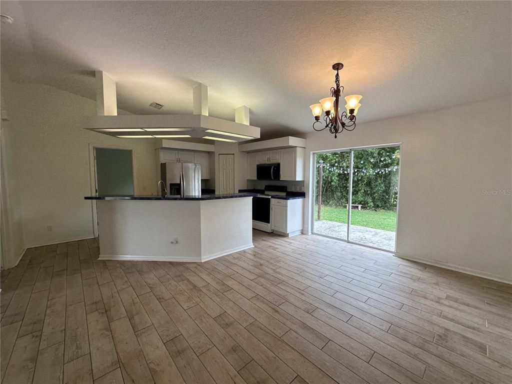 Chandelier, Interior, Kitchen, Stainless Steel Appliances, Wood Texture Flooring