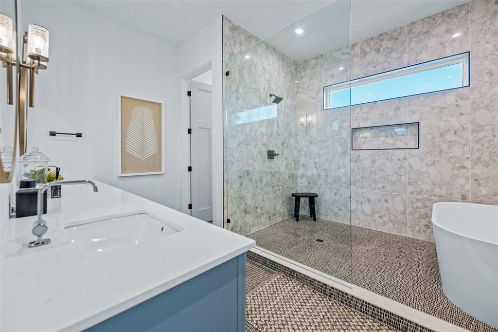 Bathroom, Free Standing Baths, Glass Shower, Interior, Marble Walls, Recessed Lighting