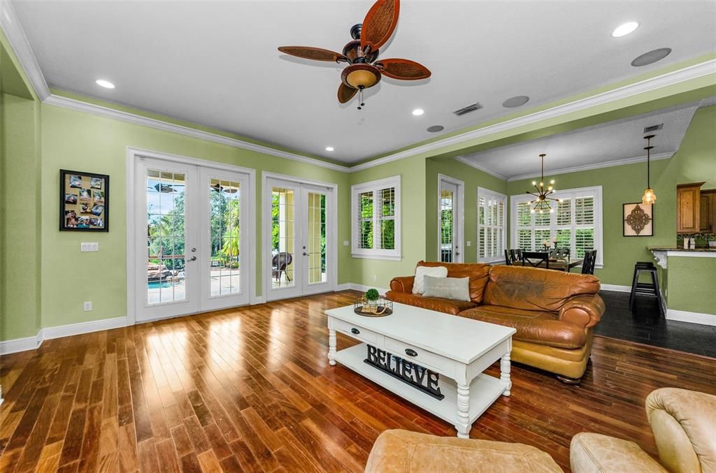 Chandelier, Dining room, Interior, Living room, Pendant Lights, Recessed Lighting, Wood Texture Flooring