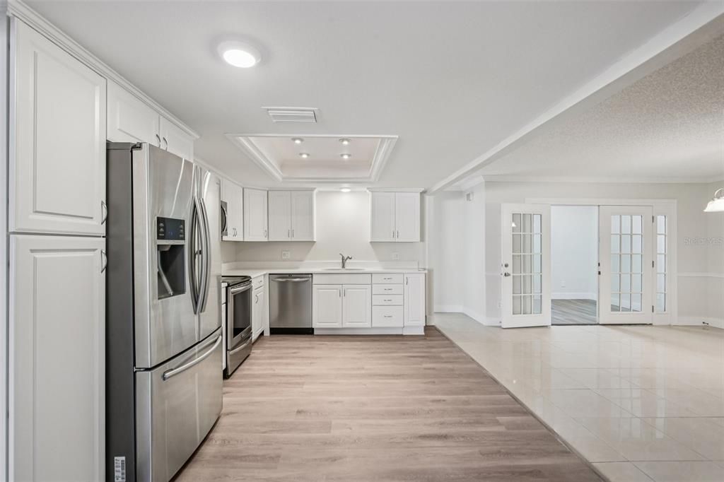 Interior, Kitchen, Recessed Lighting, Stainless Steel Appliances, Wood Texture Flooring