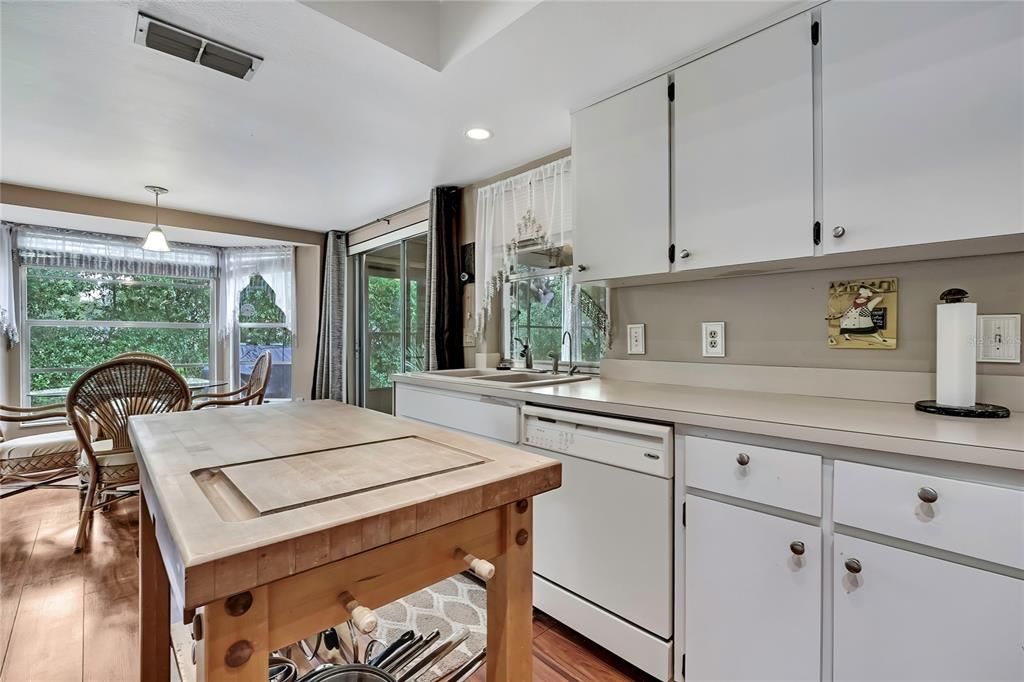 Dining room, Interior, Kitchen, Pendant Lights, Recessed Lighting, Wood Texture Flooring