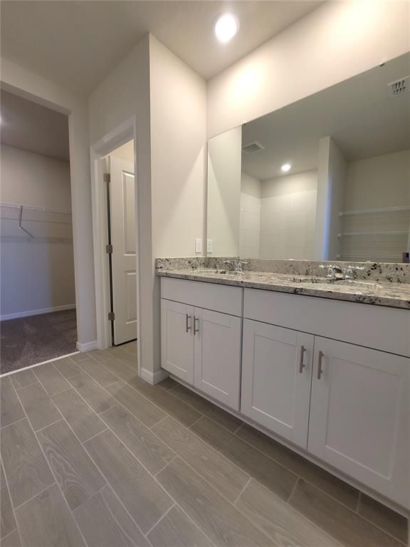 Bathroom, Dual Sink Vanities, Interior, Recessed Lighting, Walk-in Closets