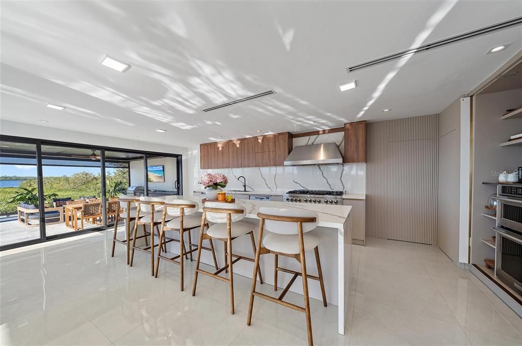 Interior, Kitchen, Marble Walls, Recessed Lighting, Stainless Steel Appliances, Water
