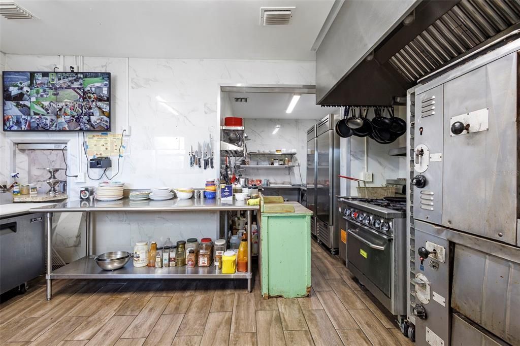 Interior, Kitchen, Marble Walls, Stainless Steel Appliances, Wood Texture Flooring