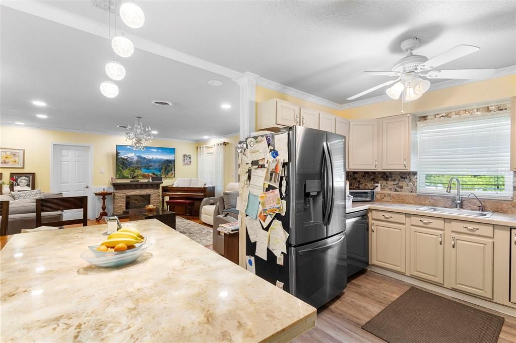 Dining room, Fireplace, Interior, Kitchen, Living room, Pendant Lights, Recessed Lighting, Wood Texture Flooring