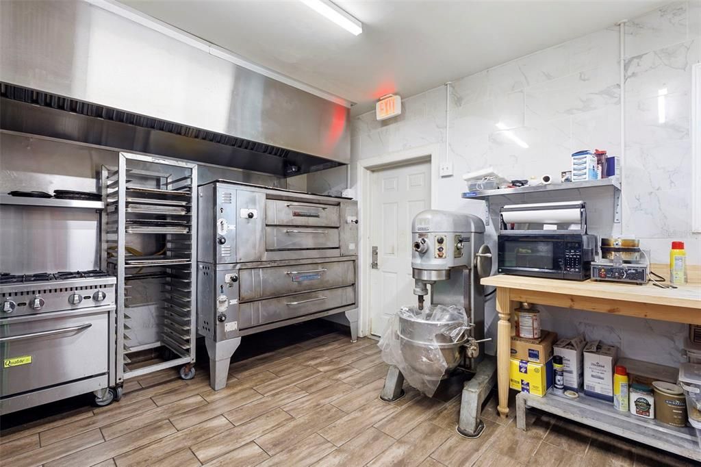 Interior, Kitchen, Marble Walls, Stainless Steel Appliances, Wood Texture Flooring