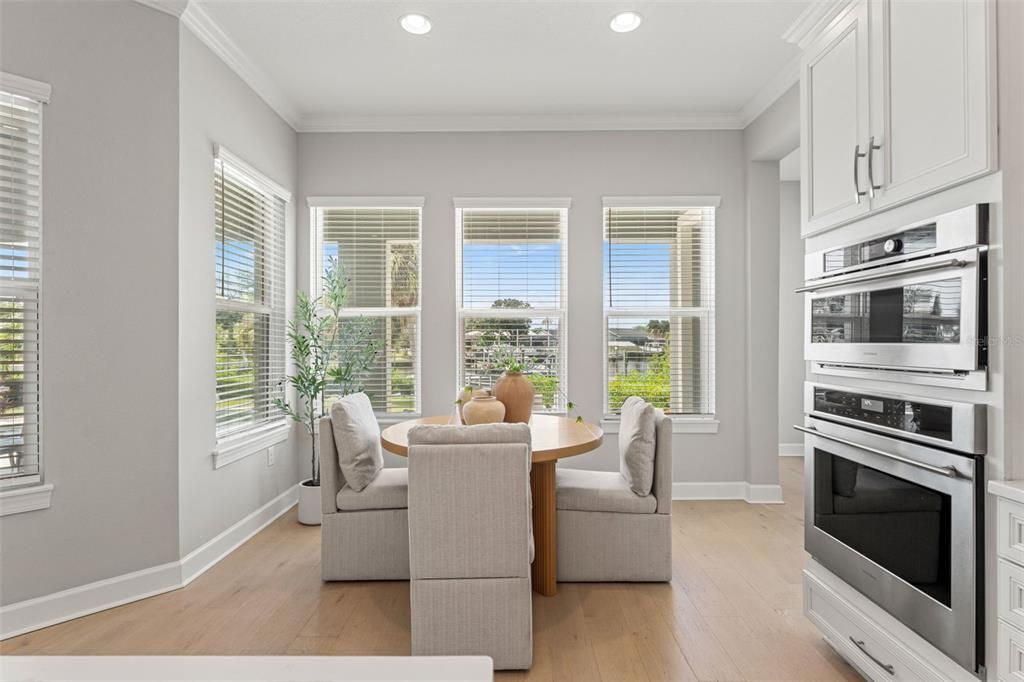 Dining room, Interior, Kitchen, Recessed Lighting, Stainless Steel Appliances, Wood Texture Flooring