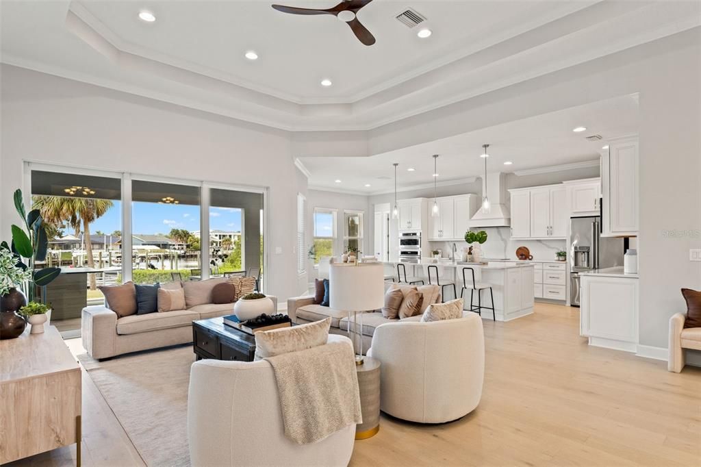 Interior, Kitchen, Living room, Pendant Lights, Recessed Lighting, Stainless Steel Appliances, Water, Wood Texture Flooring