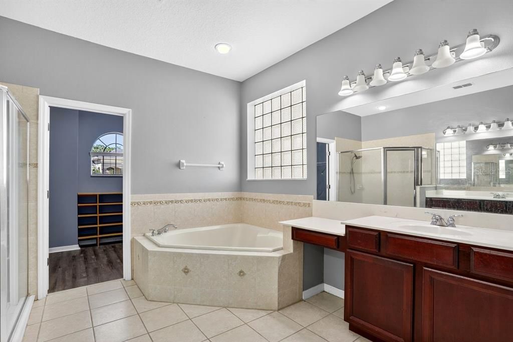 Bathroom, Dual Sink Vanities, Interior, Recessed Lighting, Wood Texture Flooring