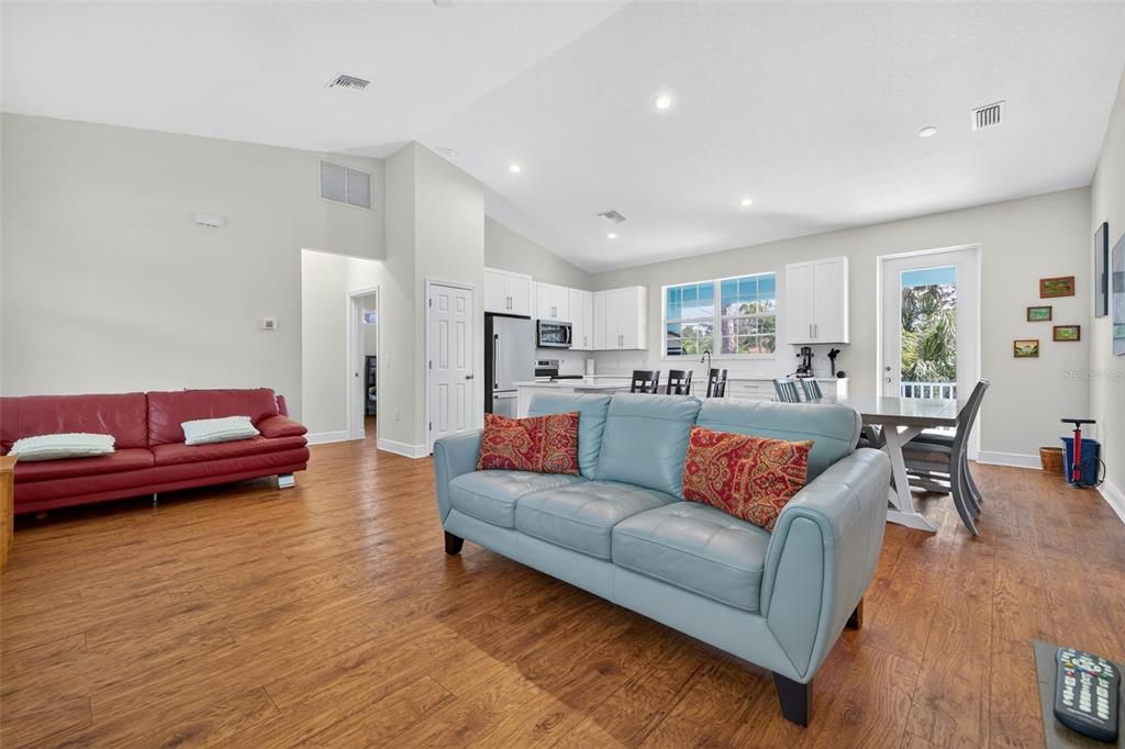 Dining room, Interior, Kitchen, Living room, Recessed Lighting, Stainless Steel Appliances, Wood Texture Flooring