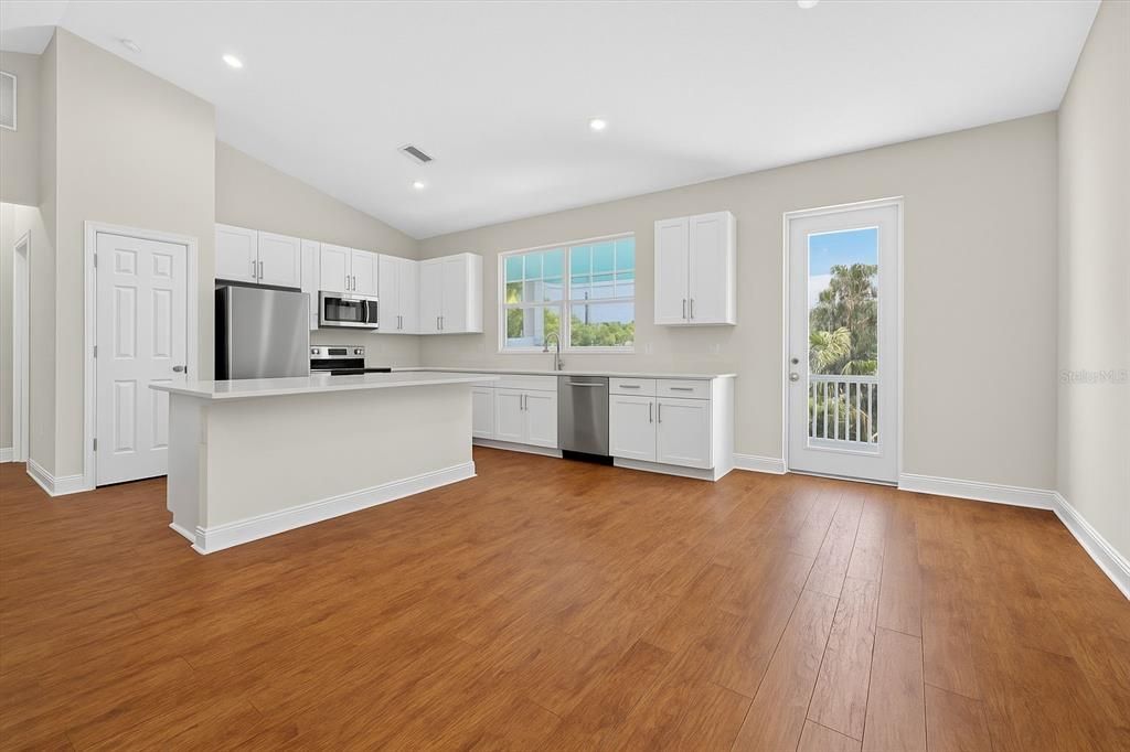 Interior, Kitchen, Recessed Lighting, Stainless Steel Appliances, Wood Texture Flooring
