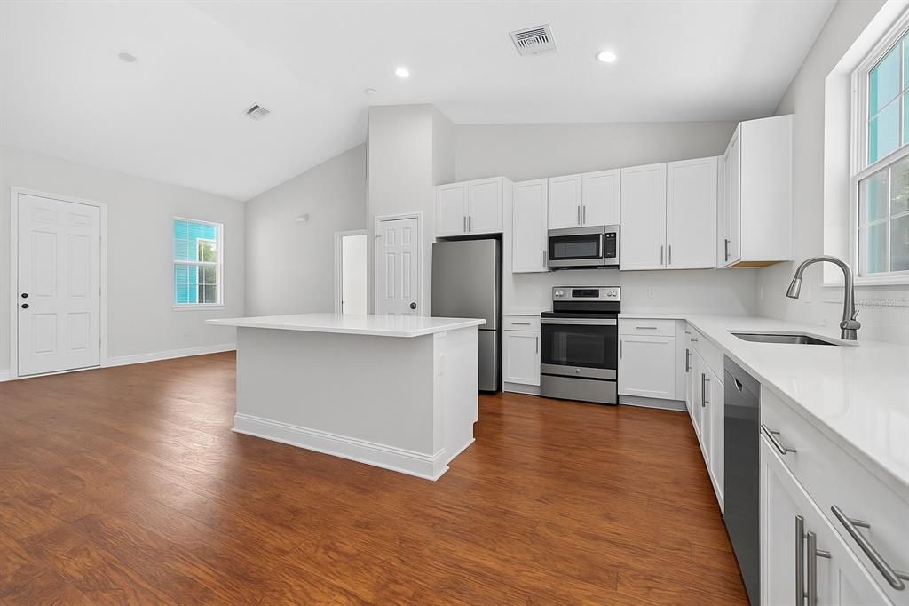Interior, Kitchen, Recessed Lighting, Stainless Steel Appliances, Wood Texture Flooring