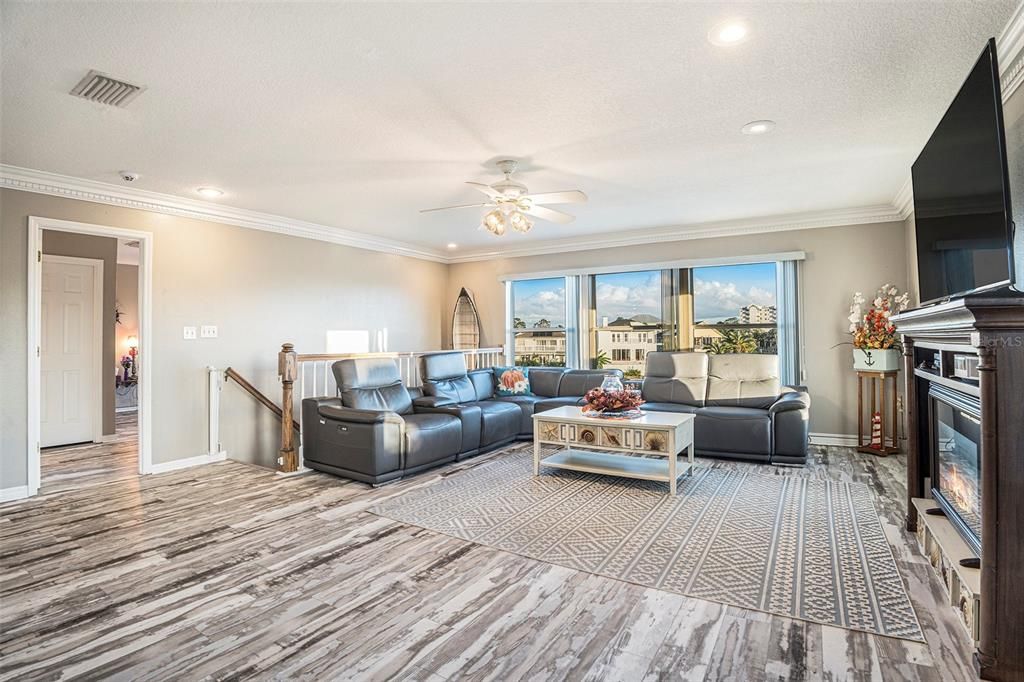 Fireplace, Interior, Living room, Recessed Lighting, Wood Texture Flooring