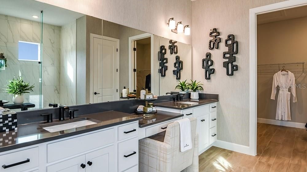Bathroom, Dual Sink Vanities, Interior, Marble Walls, Recessed Lighting, Wood Texture Flooring