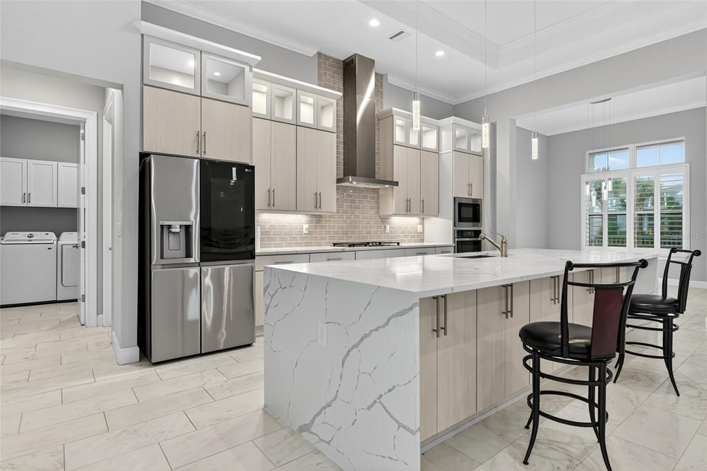 Interior, Kitchen, Marble, Marble Walls, Pendant Lights, Recessed Lighting, Stainless Steel Appliances