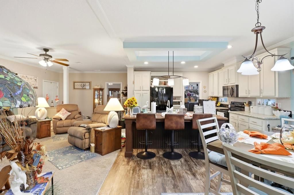 Dining room, Interior, Kitchen, Living room, Pendant Lights, Recessed Lighting, Stainless Steel Appliances, Wood Texture Flooring
