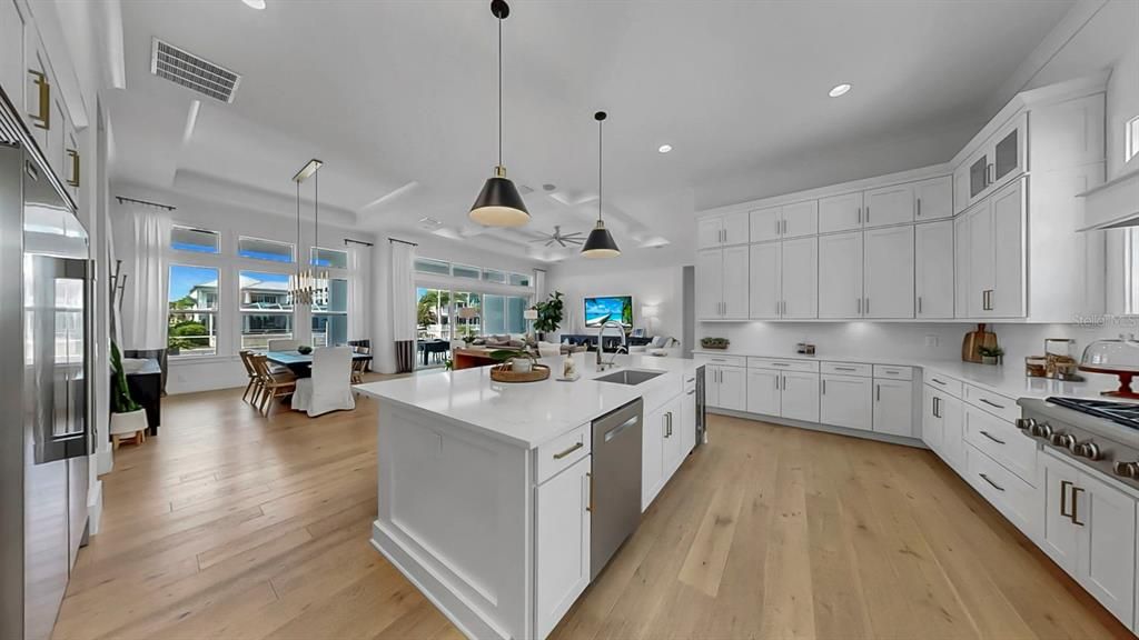 Dining room, Interior, Kitchen, Pendant Lights, Recessed Lighting, Stainless Steel Appliances, Wood Texture Flooring