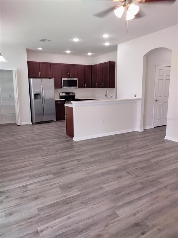 Interior, Kitchen, Recessed Lighting, Stainless Steel Appliances, Wood Texture Flooring