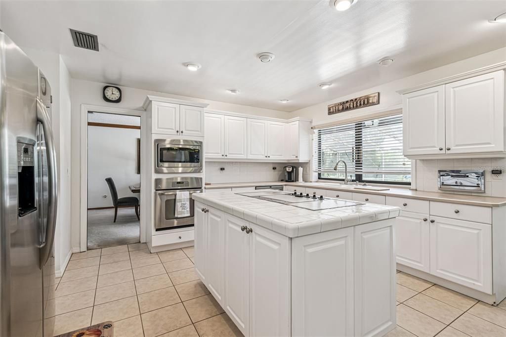 Interior, Kitchen, Recessed Lighting, Stainless Steel Appliances, Tile Countertops