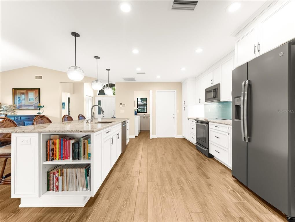 Interior, Kitchen, Pendant Lights, Recessed Lighting, Stainless Steel Appliances, Wood Texture Flooring
