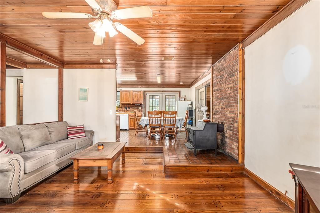 Dining room, Interior, Living room, Recessed Lighting, Stone Walls, Wooden Ceilings, Wood Texture Flooring