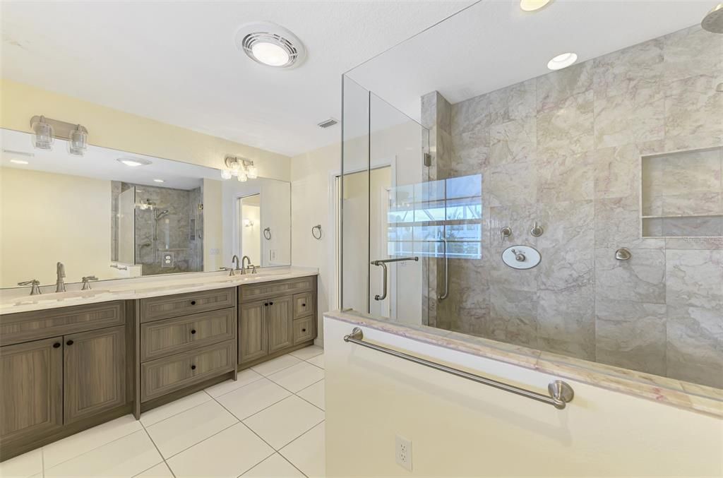 Bathroom, Dual Sink Vanities, Glass Shower, Interior, Marble Walls, Recessed Lighting