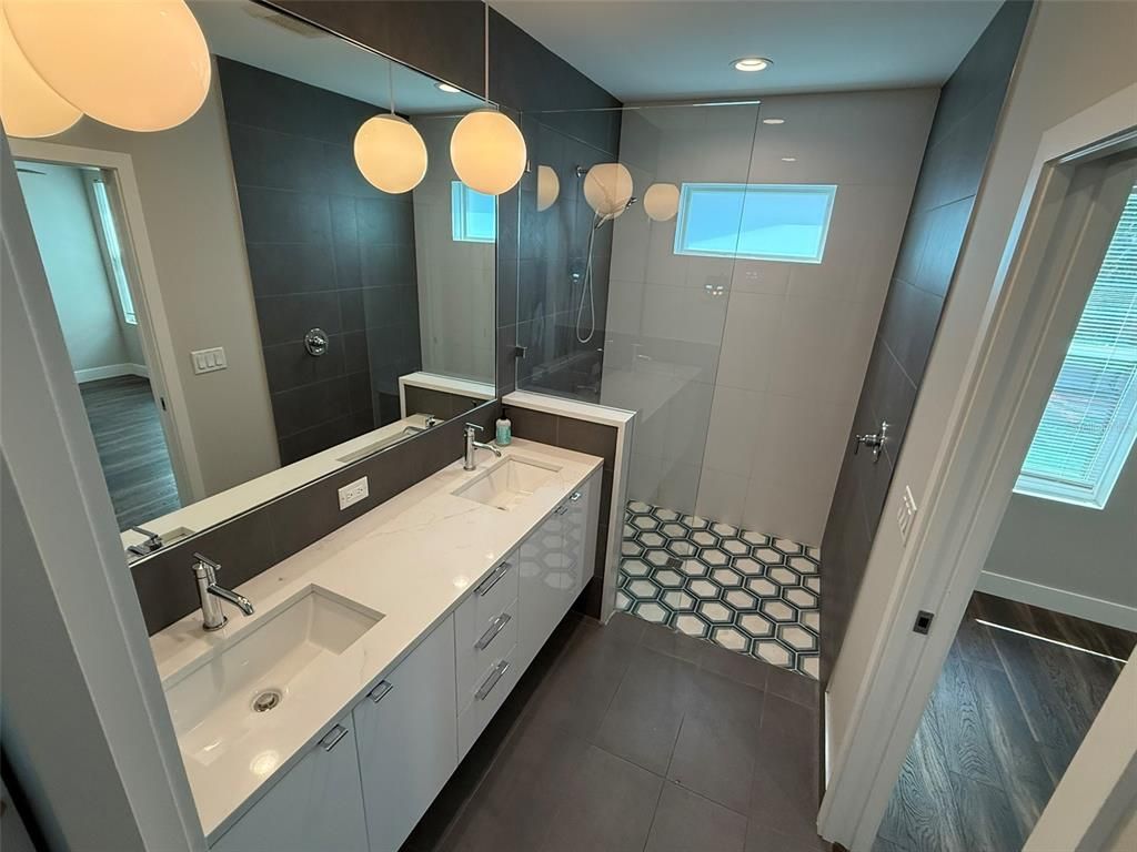 Bathroom, Dual Sink Vanities, Glass Shower, Interior, Recessed Lighting, Wood Texture Flooring