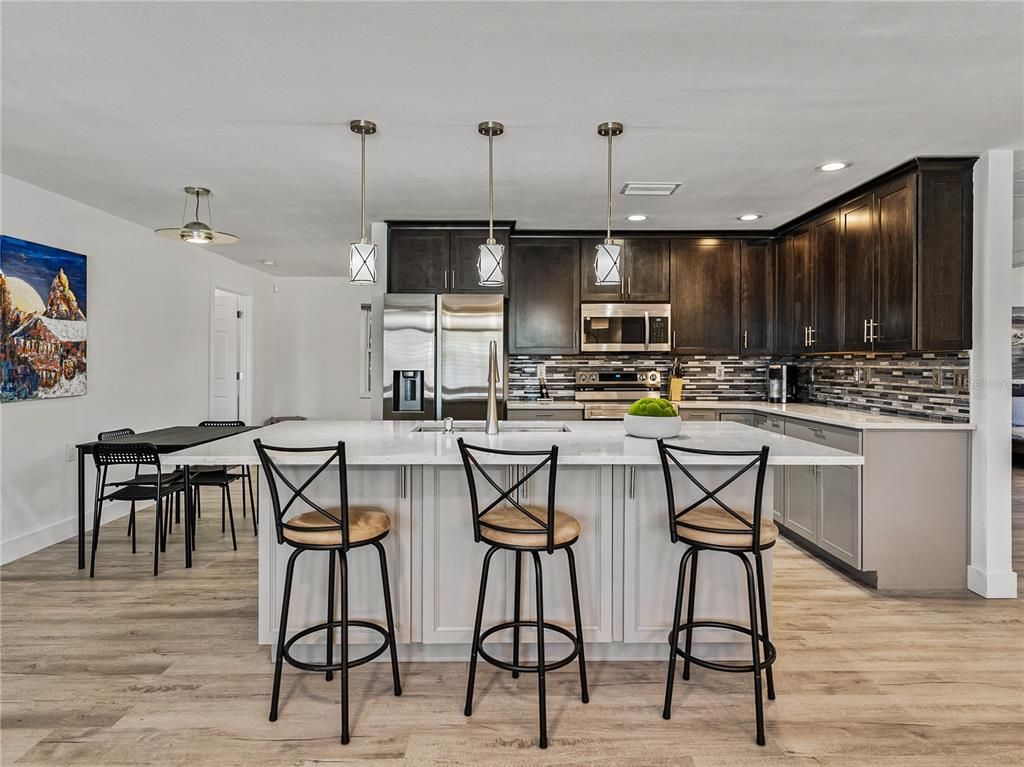 Interior, Kitchen, Pendant Lights, Recessed Lighting, Stainless Steel Appliances, Wood Texture Flooring