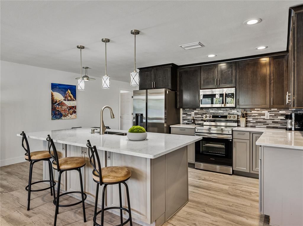 Interior, Kitchen, Pendant Lights, Recessed Lighting, Stainless Steel Appliances, Wood Texture Flooring