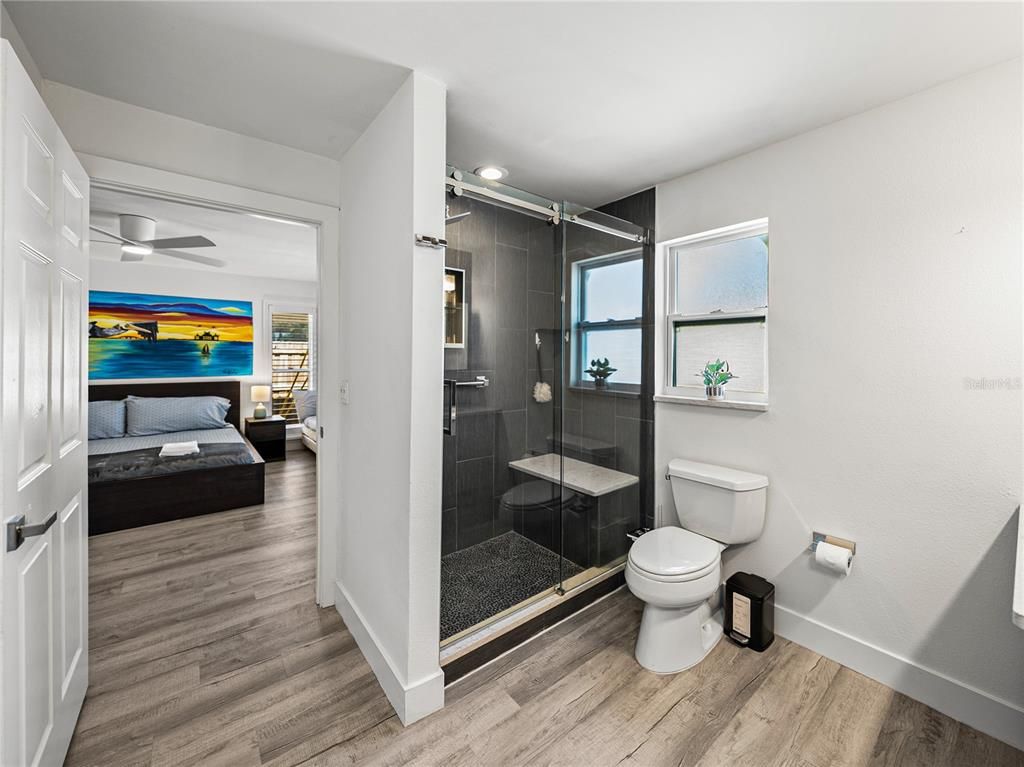 Bathroom, Bedroom, Glass Shower, Interior, Water, Wood Texture Flooring